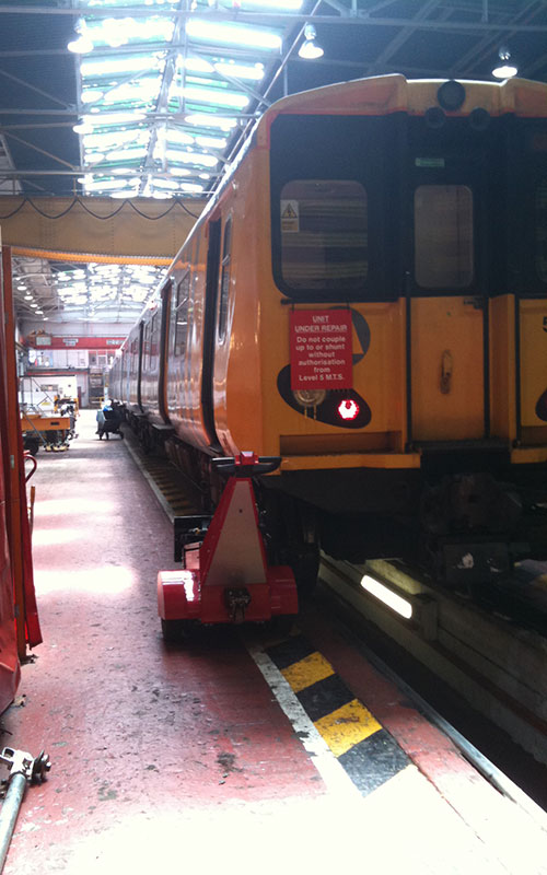 Dual Motor Super Power Pusher pushing railcars at MerseyRail Dual Motor Super Power Pusher pushing railcars at MerseyRail