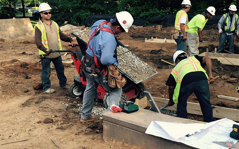Electric Wheelbarrow for hauling and tipping aggregates on construction site Electric Wheelbarrow for hauling and tipping aggregates on construction site