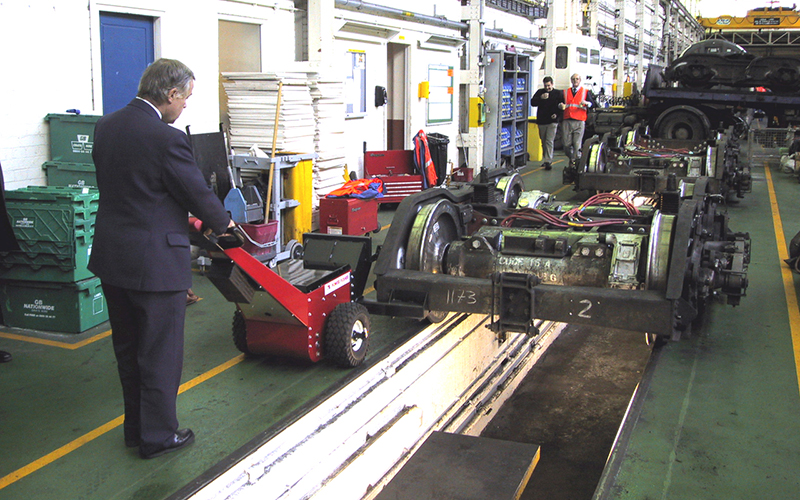 Power Pusher pushing railcar bogies in London Underground maintenance depot Power Pusher pushing railcar bogies in London Underground maintenance depot
