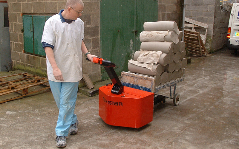 PowerTug moving clay trolley in Pottery PowerTug moving clay trolley in Pottery