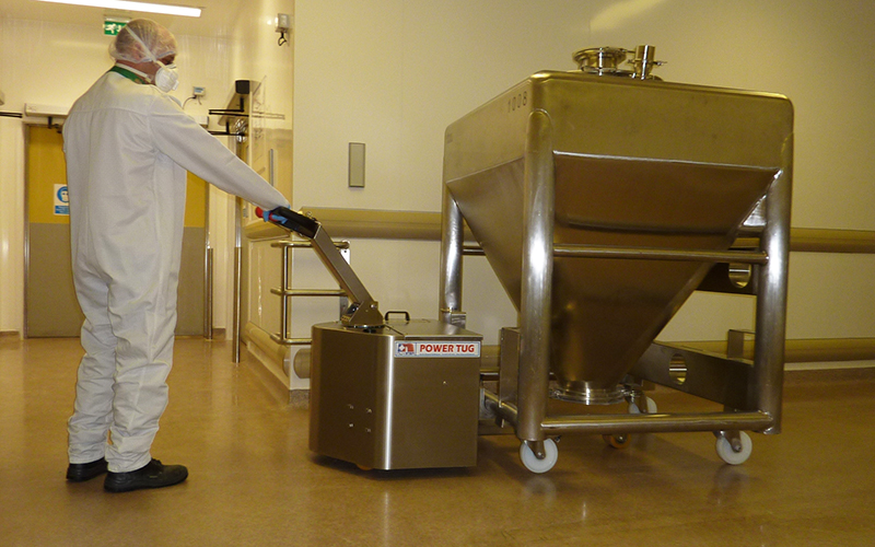 Stainless Steel PowerTug moving 1,000Kg Pharmaceutical vessel with all 4 swivel castors Stainless Steel PowerTug moving 1,000Kg Pharmaceutical vessel with all 4 swivel castors